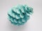 Painted arctic blue color pine cone