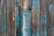 Painted in blue and grey wooden damaged texture, wallpaper and background, close-up
