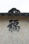 A painted Chinese character expressing good luck and good fortune painted on a wall fades