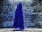 Painted cloaked figure