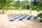 Painted Coconuts Used as Giant Checkers on a Tropical Beach