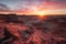 painted desert sunrise, with vibrant colors and warm light on the horizon