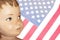 Painted doll retro young american boy face against faded American Flag background