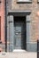 Painted doorway at entrance to traditional Huguenot weaver`s house on Princelet Street, Spitalfields, East London UK