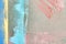 Painted drywall texture. background. stripes pink blue yellow turquoise gray