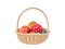 Painted easter eggs in the woven basket on white background.