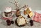 Painted eggs, cottage cheese dessert, cakes and branches of flowering apricot on a linen tablecloth.