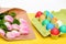 Painted eggs in egg tray. Happy easter. Spring holiday. Holiday celebration, preparation. Egg hunt. Tulip flower bouquet