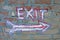 Painted exit sign on wall