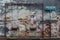 Painted Girls Playing Swing Together on The Old Brick with Concrete Wall from The Street of George Town. Penang, Malaysia