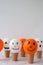Painted Jacks face on balloons. Orange and white balls preparation diy for halloween party. Halloween home activities