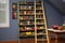 painted ladder shelf displaying cookbooks