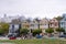 Painted Ladies houses and Downtown background from Alamo Square.