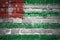 Painted national flag of abkhazia on a brick wall