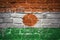 Painted national flag of niger on a brick wall