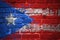 Painted national flag of puerto rico on a brick wall