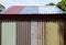 Painted and rusty corrugated iron