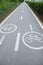 Painted signs on asphalt for bicycle dedicated lanes. A separate bike path in the city