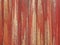Painted slate. Streaks of red paint on a corrugated surface. Expression. Background pattern