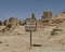 Painted steel sign for Gebel Al Mawta, the `Mountain of the Dead`, in Siwa Oasis, Egypt.