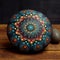 Painted stone with colorful mandala decoration