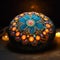 Painted stone with colorful mandala decoration