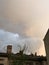 Painted storm clouds hang over an apartment building in Ukraine - KYIV