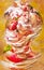 Painted strawberry sundae with whipped cream