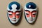 Painted traditional japanese kabuki theater mask made of ceramic, wood, lacquer and clay. Highly ornate and exaggerated design.