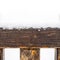 Painted wooden board and rungs covered with snow