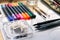 Painter, graphic designer or calligraphy work space, different kind of tools, brushes, marker and pen, place ready to create now d