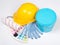 Painter\'s tools - brushes, work gloves, helmet and bucket of blu