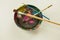 Painter work supplies paint brushes paint wooden mixing bowl