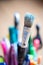 Painting artwork: paint brushes on creative background