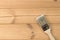 Painting brush on wooden unpainted surfaces