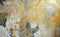 Painting on drywall, yellow paint, silver patina, composition, texture