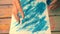 Painting finger paints gouache abstract pattern close-up.