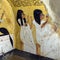 Painting of kneeling Inherkhau and Wab with arms raised in worship in TT359, the Tomb of Inherkhau in Deir el-Medina.