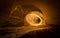 Painting with light - fire spinning in closed space