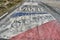 Painting of team jersey of tour de france at Col d Izoard