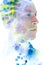 Paintography. Double exposure profile portrait of an attractive male model combined with hand drawn blue green and yellow