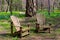 Pair of adirondack chairs in the woods