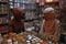 pair of aliens haggling over price of spices in bustling bazaar