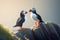 A pair of Atlantic Puffins stand on an Icelandic rock beak to beak AI generated