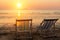 Pair of beach loungers on the sea sunset. Nature.