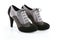 Pair of black and gray stiletto shoes