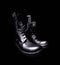 A pair of black leather military boots on black background