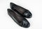 Pair of black patent leather womens shoes