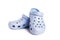 Pair of blue Crocs sandals with a distinctive design on a white background