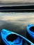 Pair of Blue Kayaks on Empty Still Lake